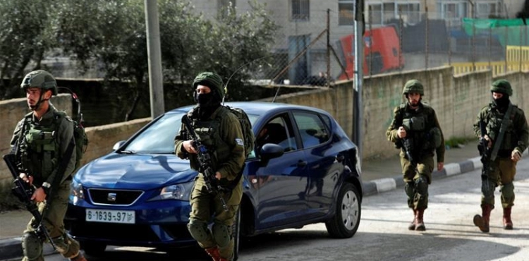 Israeli occupation arrests 9 Palestinians from the West Bank