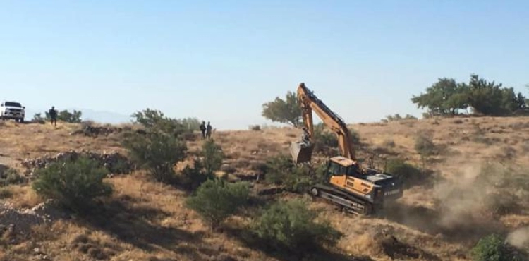 The occupation demolishes a park and uprooting trees in Umm al-Khair in Hebron
