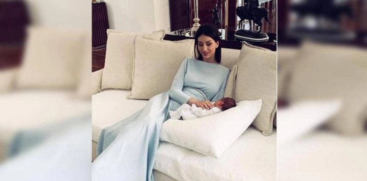 After the divorce .. Miss Russian beauty challenges the &quot;test of paternity&quot;