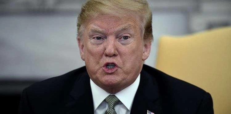 Trump defends his criticism of a black MP