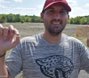 Luck smiles at an American teacher on his summer vacation
