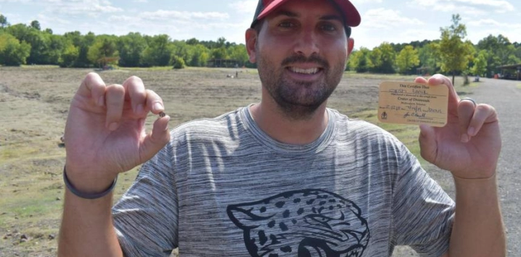 Luck smiles at an American teacher on his summer vacation