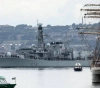 A British destroyer sails the Gulf to escort oil tankers