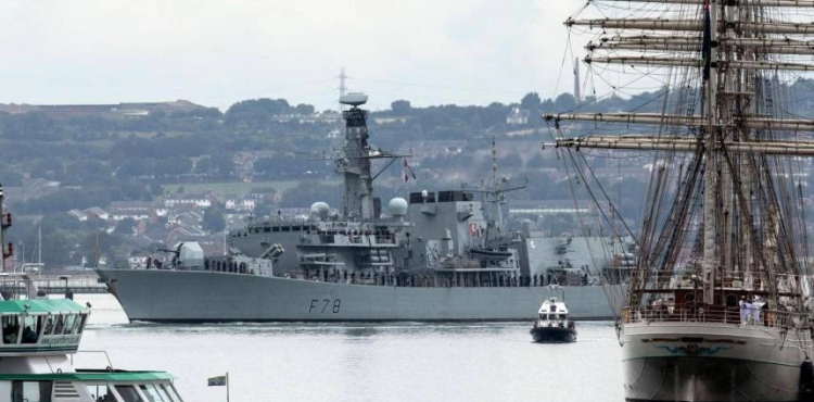 A British destroyer sails the Gulf to escort oil tankers