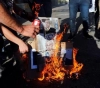 Citizens burn photos of Netanyahu during hebron incursion