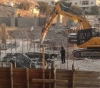 The occupation demolishes two buildings under construction in Eizariya