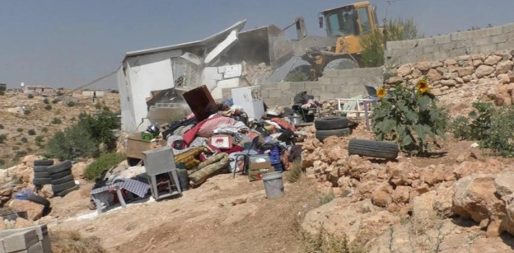 The occupation demolishes houses and closes roads south of Hebron