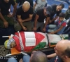 Thousands mourn the body of martyr Adawi in Balata camp
