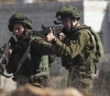 Israeli forces arrest youth, shoot at Gaza border