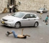 A settler runs over a child east of Bethlehem
