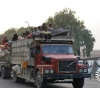 More than 2,300 people are fleeing to Iraq to escape fighting in northeastern Syria