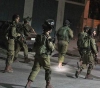 Eleven Palestinians were arrested at dawn today