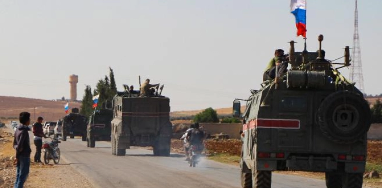 Russian troops patrol northern Syria near the Turkish border