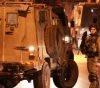 Israeli occupation arrests 22 Palestinians from the West Bank