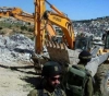 Israeli forces demolish part of the wall of the school &quot;challenge 17&quot; Jenin