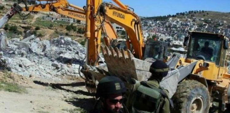 Israeli forces demolish part of the wall of the school &quot;challenge 17&quot; Jenin