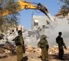 Israeli forces demolish a house in Jbara village south of Tulkarm