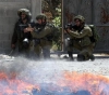 Occupation injures a boy with metal bullets in Hebron
