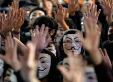 A demonstration in Hong Kong to protest the killing of a demonstrator and the arrest of deputies in favor of promoting democracy