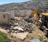 The occupation forces a family to self-demolish its home in Al-Mukabber