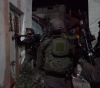The occupation forces arrested 4 young men and stormed separate areas of the West Bank