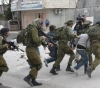 Two youths injured and arrested during clashes in Qalandiya refugee camp