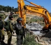The occupation demolishes a house in Beit Hanina