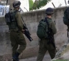 The occupation forces arrest 3 civilians and raided separate neighborhoods in Hebron