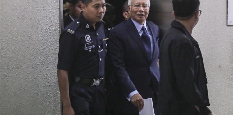 Former Malaysian prime minister appearing before court on corruption charges