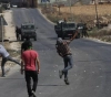 The occupation forces arrested a young man after he was hit with a rubber bullet in Al-Fawwar camp