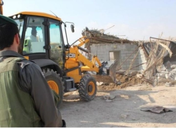 Israeli occupation forces demolish a house and a garage northwest of Bethlehem