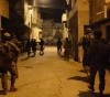 Occupation arrests 8 citizens, including an editor