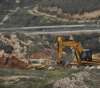 Dredging olive-planted areas in Azzun