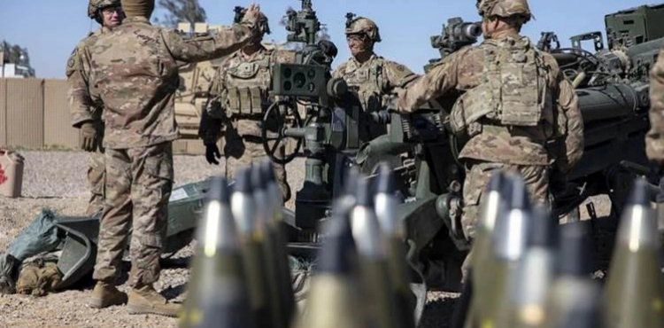 American forces hand over a military base to Iraqi forces