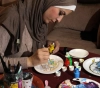 A journalist from Gaza exploits domestic stone to restore her hobby in painting