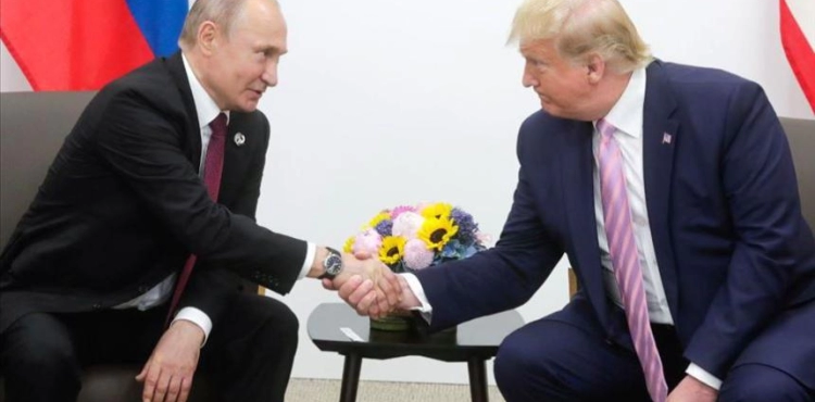 Trump and Putin hail the cooperation and &quot;trust&quot; between their two countries in remembrance of a meeting during WWII
