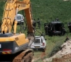 Settlement leveling in the Burin lands, south of Nablus