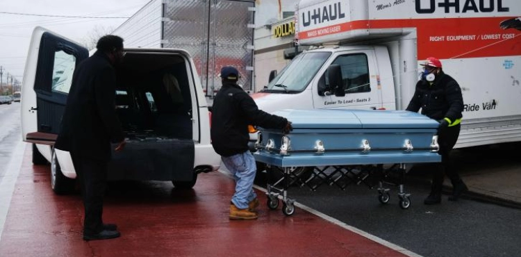 An investigation in New York after finding dozens of bodies inside trucks
