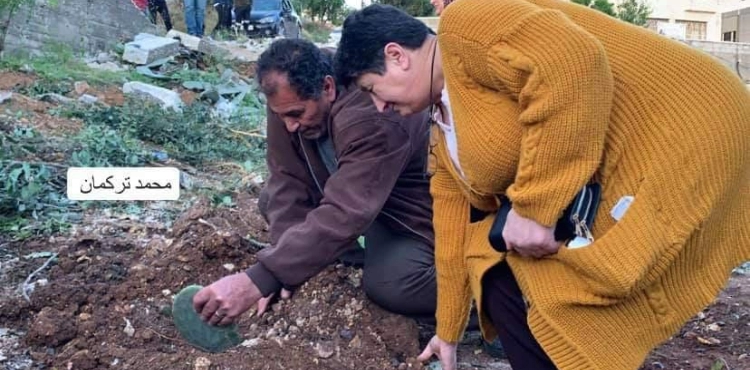 After their house was demolished. The parents of the prisoner Kassam Barghouti plant a seedling &quot;cactus&quot; in his vicinity