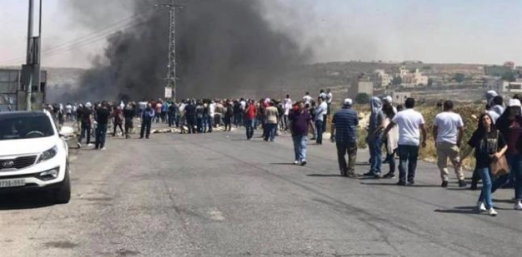 Clashes with Israeli occupation forces at &quot;Beit El&quot; Checkpoint