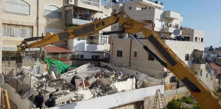 The occupation forces a Jerusalemite family to demolish their home in Jabal Al-Mukabber