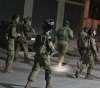 The occupation forces arrested 22 citizens, including two high school students