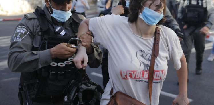 The occupation police suppress a march against the killing of Iyad al-Hallaq in Jerusalem
