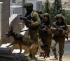The occupation forces raided 50 houses in Al-Auja