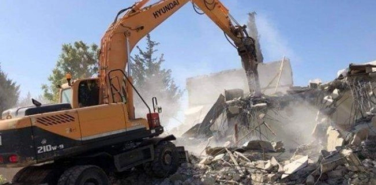 Video Israeli bulldozers demolish two apartments and 4 commercial warehouses in Shuafat camp