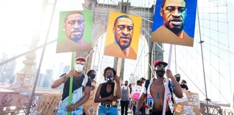The United States commemorates the end of slavery in the midst of turmoil in its racist past