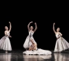 Students of the Paris Opera Ballet School maintain balance despite the greenery