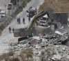 The Wall and Settlement Resistance Commission: 313 demolitions during the first half of this year