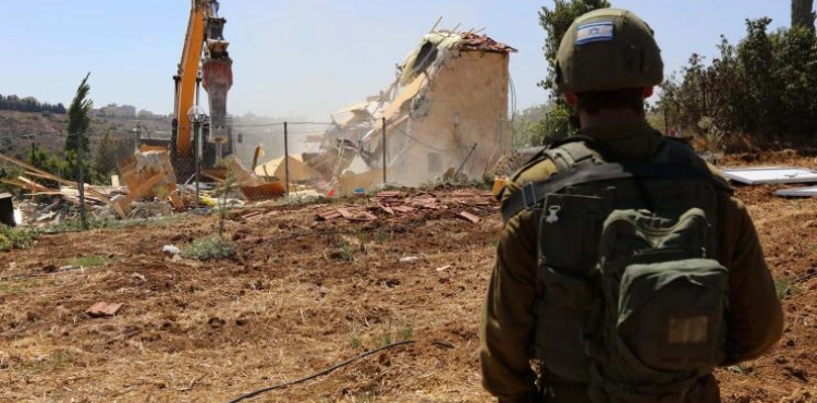 The occupation demolishes a house under construction in the Chiyah neighborhood of Jabal Al-Mukabber