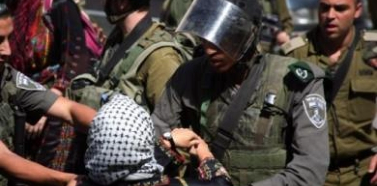 The occupation forces arrest a woman and her two sons while they were kidnapping a child by settlers in Hebron